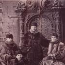 Four men in fur coats